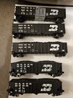 N Scale  Mixed Set Of 70   90 Ton Hopper Cars  One Unit Missing A Set Of Wheels