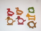 7 Vtg Red  Green  Butterscotch Bakelite Animal Napkin Rings place Car Holders