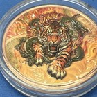 Prowling Orange-and-black Tiger Intertwined With A Green Dragon Amidst Flames 
