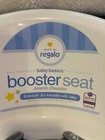 Regalo Baby Basics    Portable Booster Seat White Attach To Chair 3 Point Harness