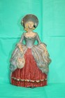 Antique Cast Iron Doorstop  woman In Red Dress 