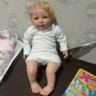 22in Reborn Baby Dolls Smiling Lifelike Toddler Realistic Newborn Cloth Body Toy