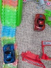 Ontel Magic Tracks Glow In The Dark Racetrack Set With 2 Led Cars