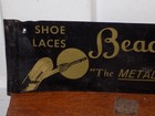 Vintage Beaded Tip Shoe Laces Tin Sign