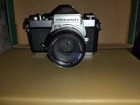 Nikkormat Vintage 35mm Film Camera And 303 Metz W  58mm  23mm  And 135mm Lenses 