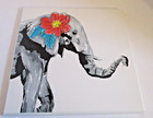 Stupell Home Decor Collection Elephant With Flowers Plaque  sku  2928 