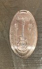 Dollywood New Pressed Pennies Dolly Parton Signature And Microphone With Guitar