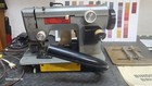 National Brute 126 Single Pull Binding Portable Carpet Binding Machine Powers On