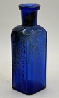 Vintage W o  Luttmann Chemist New York  Ny  Blue Cork Top Embossed Glass Bottle