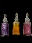 Set Of 3 Vintage Like Bottles With Stoppers Purple  Pink And Orange 