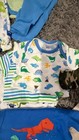      Nwot Baby Unisex Clothes Lot Dinosaurs Pajamas Burp Cloth Hat Socks Gerber