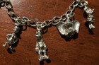 Vintage Walt Disney Productions Silver Tone Charm Bracelet 7 Disney Characters 