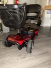 Red 4-wheeled Electric Mobility Scooter With Padded Seat  Basket  Headlight