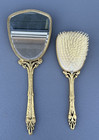 Vintage 2 Piece Dresser Vanity Set Gold Toned Hand Mirror Brush Set