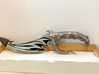 Fantasy Collectible Set Featuring A Dragon-themed Dagger And Short Sword With An