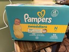Pampers Swaddlers Newborn Size N Diapers Up To 10 Lb  84 Count  Opened Missing 1