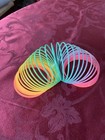 Rainbow Plastic Coil Spring Slinky  You Get 6 Of Them Fun To Play