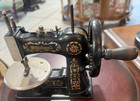 Antique Child   s Miniature Cast Iron Stitchwell Sewing Machine