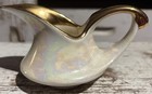 A Modern China Company Creamer From Sebring  Ohio  With 22-karat Gold Accents 