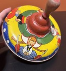 Vintage Tin Spinning Top Wood Handle Toy Dutch Boy   Girl Ice Skaters Made Usa