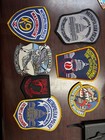 Lot 8 Fire And  Police Patches As Well As Military  3 Challange Coins