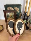 Vintage Silhouette Portraits In Oval Frames