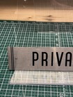    private    Art Deco Vintage Old Stock Metal Sign 9 X 2 Inches   Excellent