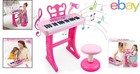 Pink Electronic Piano Toy For Kids With 37 Keys  Stool And Microphone Included