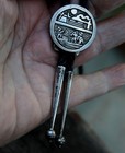 Small Vintage Navajo Handmade Sterling Silver Storyteller Bolo Tie