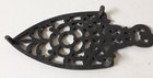 Vintage Cast Iron Footed Antique Trivet Flower Arrowhead Design