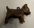 Vintage Ideal Dog Food Metal Good Luck Charm