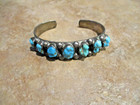 Substantial Old Pawn Navajo Sterling Silver Seven Turquoise Nugget Row Bracelet