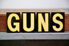 Vintage Metal Sign Smaltz Paint Guns Winchester Remington Hunting Rifle Cabinet