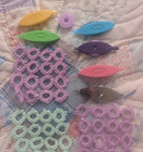 6 Tatting Shuttles  1 Metal  5 Plasic  And 7 Tatting Squares
