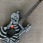 Solid Body Electric Skull   Bones Guitar Stainless Rounded Fret Tremolo Bridge