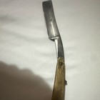 Celebrated Hollow Ground Straight Razor With Engraved Handle