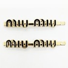 Miu Miu  Hairpins Gold Black  1654114