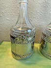 Vintage Glass Decanter Set Of 2 W Chrome Pierced Metal Sleeve 11    Bareware