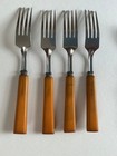 11 Pieces Of Silverware With Butterscotch Bakelite Handles