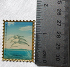 Vintage Triple Dolphins Jumping Enamel Looking Stamp National Wildlife Fed 