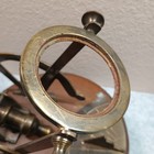 The High Noon Sundial With Brass Cannon On Base