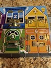 Melissa   Doug Latches Wooden Activity Board Learn And Play Numbers  Colors
