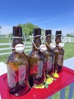 Vintage Grolsch Amber Glass Swing Top Beer Bottles Set Of 4 Embossed