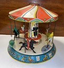 Vintage 1950   s Unique Art    kiddy-go-round    Large Tin Litho Wind-up Carousel Toy