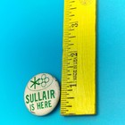 Sullair Vintage Advertising Pinback Button White Green Sullair Is Here