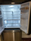 Ge Refrigerator - Bottom Freezer  Top French Doors  Purchased 1 Year Ago 