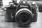      Nikon Em 35mm Film Camera  3 Lenses  Flash  Motor Drive  Strap - Tested 