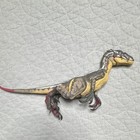 Amber Collection Jurassic Park Male Velociraptor