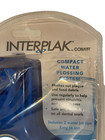 Nip Interplak By Conair Compact Water Flossing System   dented Packaging 