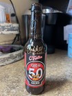 John Ulett Signed Kshe 95 Real Rock Radio 50th Anniversary Beer Bottle     empty 